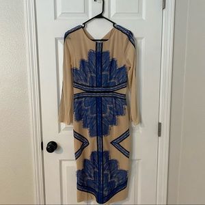 Blue lace dress with black leather details